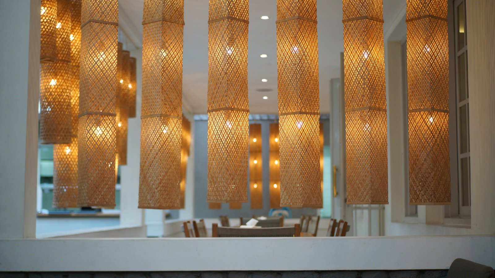 Ceiling lamp decoration in the cafe lobby. Interior design concept with light ornament.