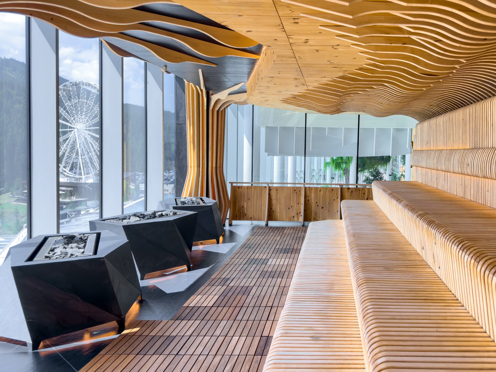 Spacious modern sauna with wave shaped wooden elements and panoramic mountain view windows. The combination of warm wood tones and natural light creates a relaxing atmosphere. SSUCv3H4sIAAAAAAAAA41Py46DMAz8F59BSoCywK9UPeThUquUVMFstUL593Uo1V43pxlPPDPegDwM0NRd1apGlda6utT6qsqutdfS6c71fXPqNVZQgDeMMOi6UV+qq/q2PulGySvAmoUcDBvQNK0LR8MUZhhEiTh7jDtETxwimUlYKmBhw+uCi6wJc+I9irrzj995y3MpKOHLajNIxT9nlwLMiLP7yf4pF5nQ7HFnke4vxvg4sgPfcsUMn5EczePRSU4JjzeeA+fdPYGDu5M/lt9n3EimMWfB+pyC8egPebUPYv7QiN+Er7/fKaVfBXn4kIQBAAA=